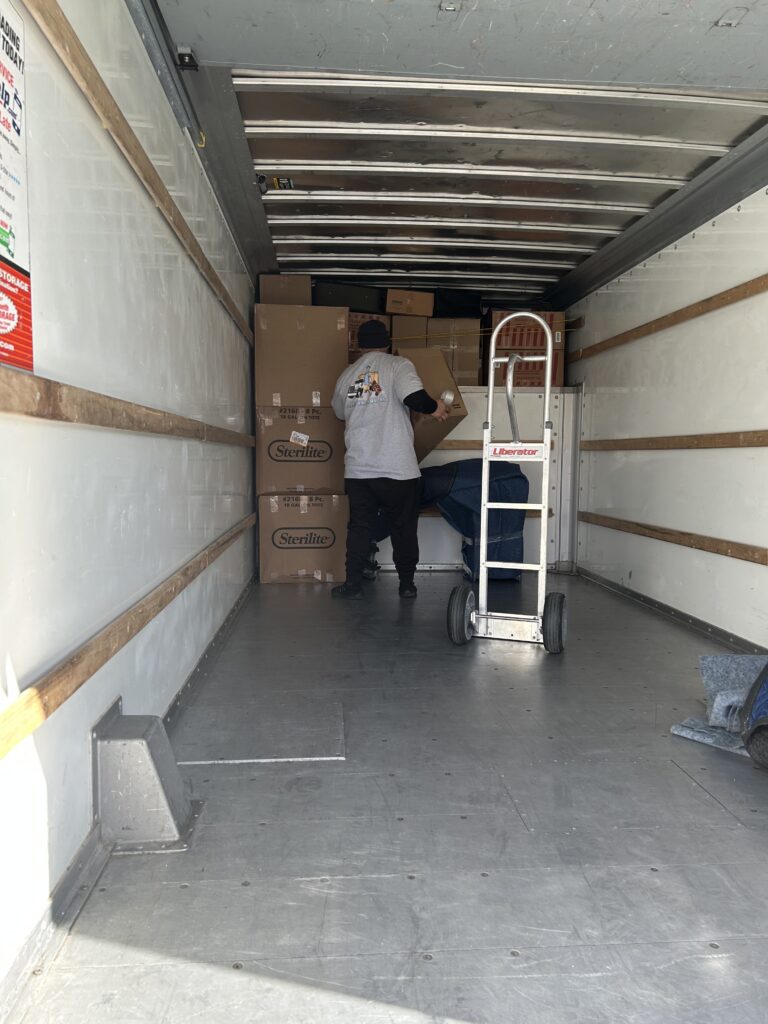 "Local Wildomar Movers in Wildomar loading furniture into a truck"